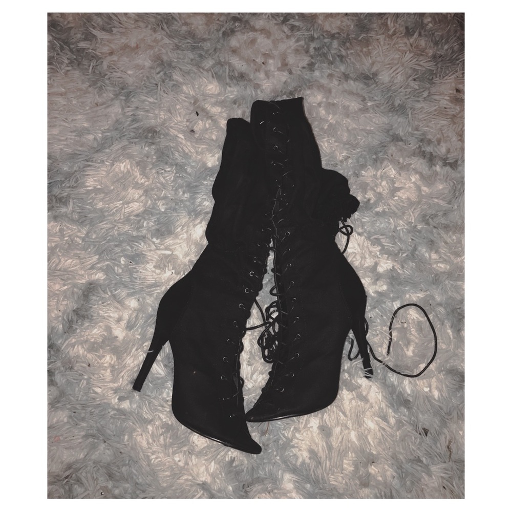 Laced up thigh high heels